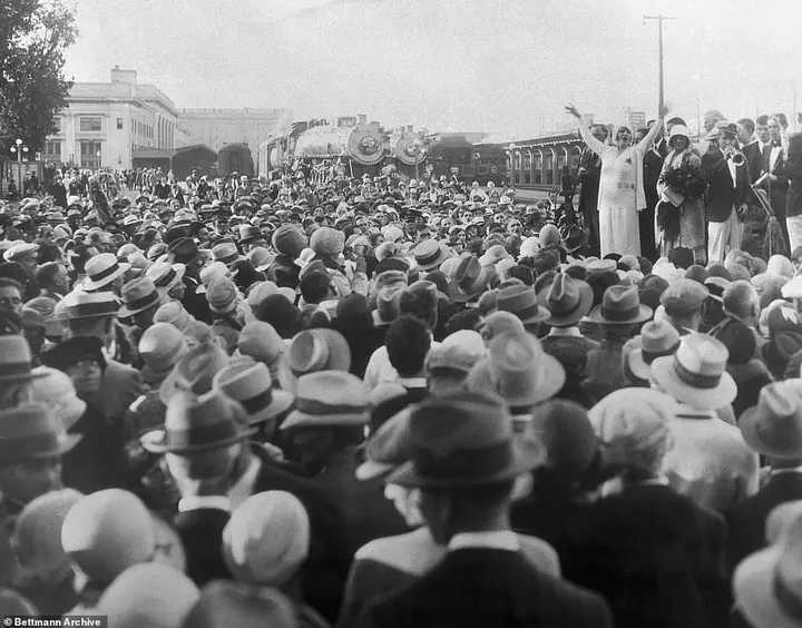 Thousands of followers clamored to catch a glimpse of Aimee Semple Mcpherson as she arrived at the train station in Los Angeles after a three-month long revival tour of Europe and the Holy Land in 1926