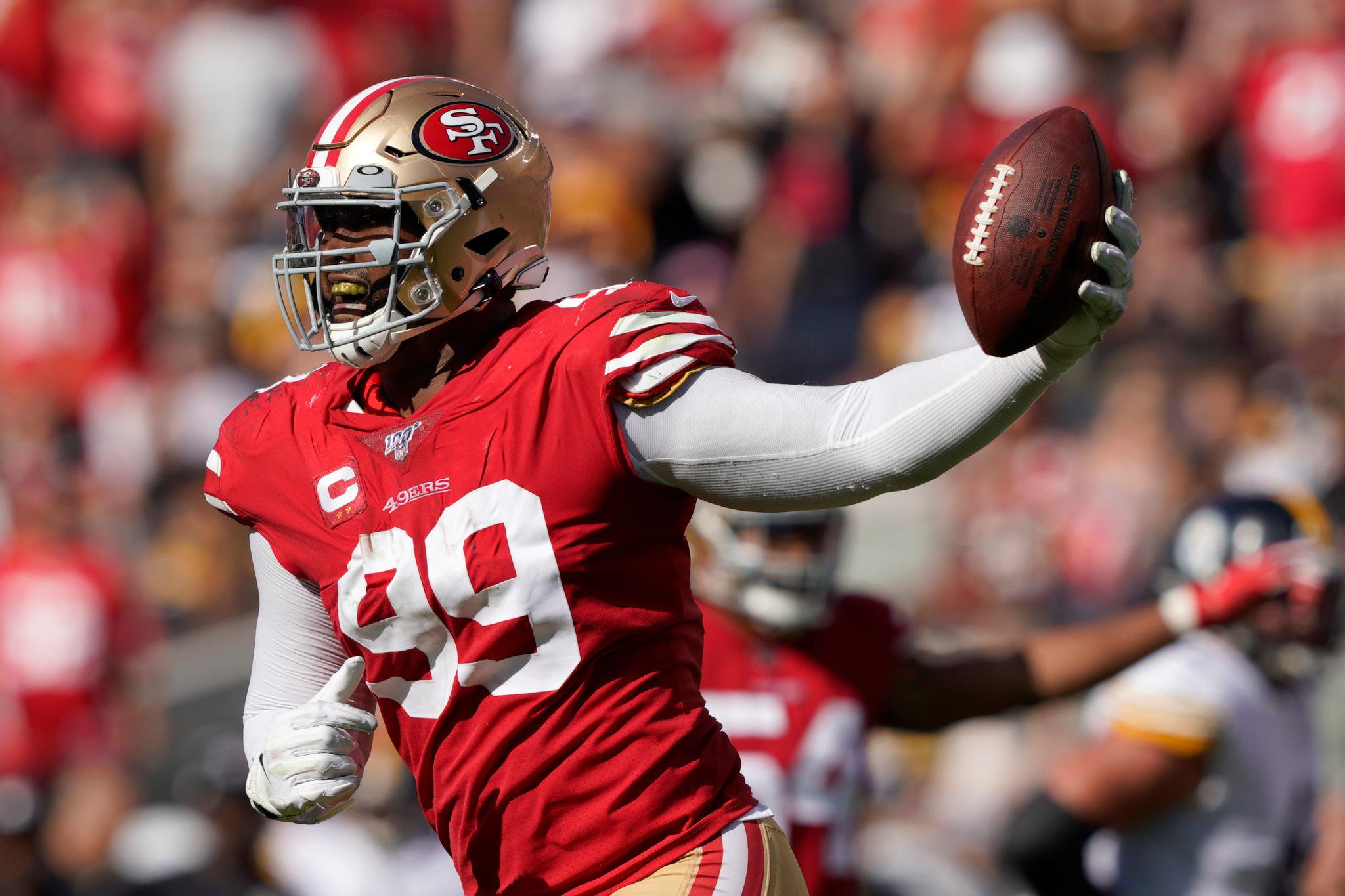 San Francisco 49ers defensive tackle DeForest Buckner celebrates after recovering a fumble against the Pittsburgh Steelers.