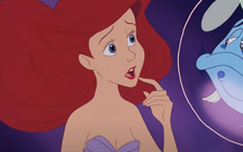 Ariel from The Little Mermaid looks thoughtful with her finger on her chin. Flounder, beside her, appears worried