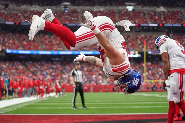 New York Giants running back Cam Skattebo celebrates in the end zone after his touchdown during the second half of an NFL football game against the Houston Texans in Houston, Sunday, Oct. 25, 2026. (AP Photo/Eric Smith)