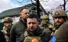 An otherwise stoic Ukrainian president Volodymyr Zelensky looks disturbed as he visits Bucha for the first time after it was liberated from Russian occupation in April 2022 (AFP)