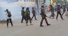 Police launch teargas and engage with protesters along Moi Avenue, Nairobi CBD.