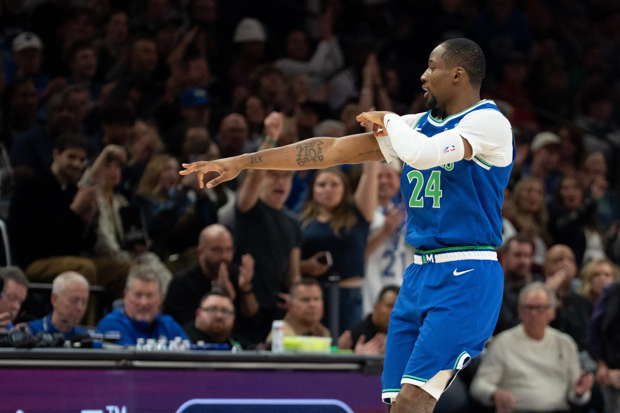 Minnesota Timberwolves forward Jonathan Kuminga celebrates making a shot against the Toronto Raptors.