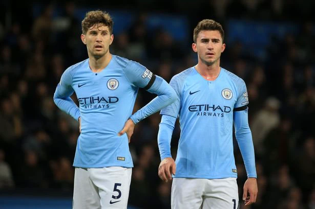 John Stones and Aymeric Laporte of Manchester City.
