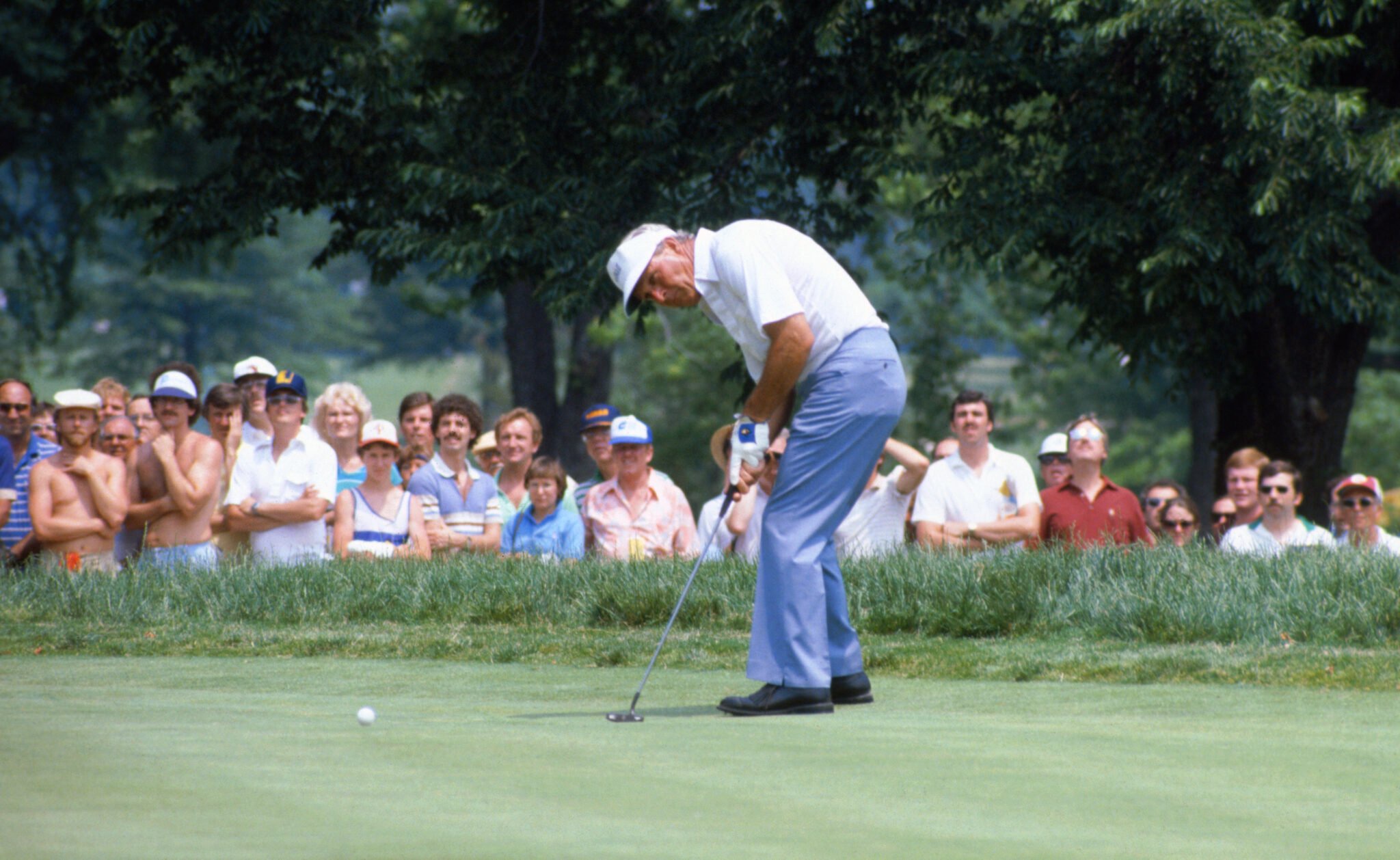 (Original Caption) Oakmont, Pennsylvania: Professional golfer Arnold Palmer putts during the U.S. Open golf tournament in Oakmont.
