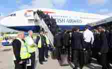 Chelsea players boarding a plane. (