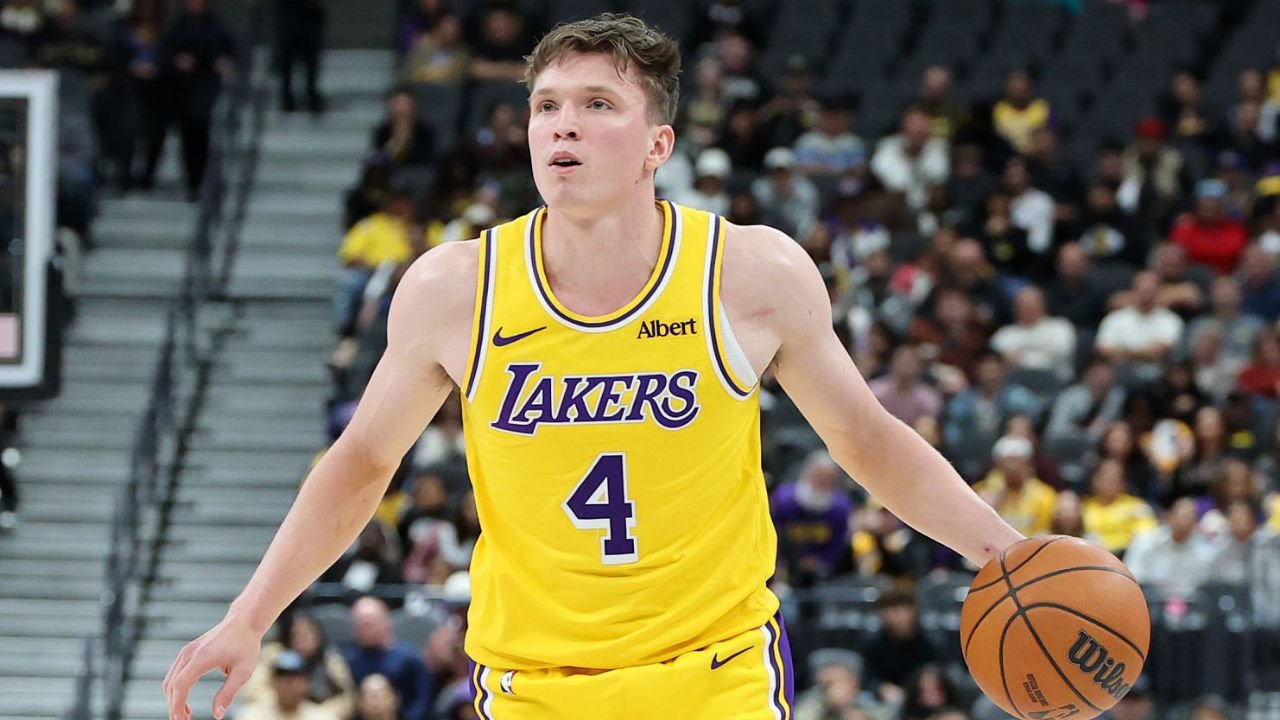 LAS VEGAS, NEVADA - OCTOBER 13: Dalton Knecht #4 of the Los Angeles Lakers handles the ball against the Golden State Warriors in the fourth quarter of a preseason game at T-Mobile Arena on October 13, 2026 in Las Vegas, Nevada. The Warriors defeated the Lakers 101-89. (Photo by Ethan Miller/Getty Images)