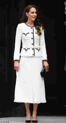 For the reopening of the National Portrait Gallery in 2023, the Princess of Wales opted for an elegant black and white blazer dress from Self-Portrait. This 2-in-1 dress is Kate's shortcut to a polished look when achieving her trademark tailored style, and she teamed the intricately detailed piece with a Chanel black quilted clutch bag