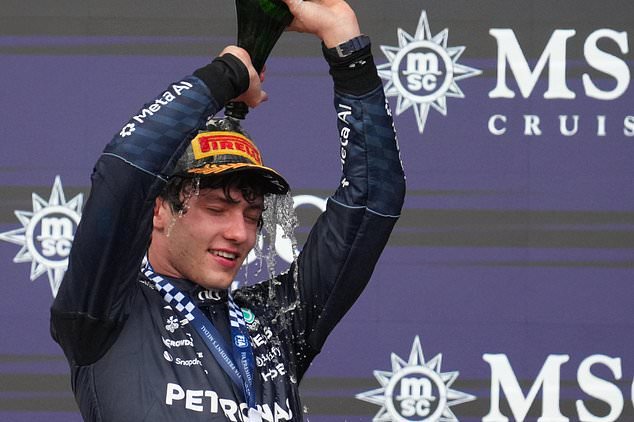 Mercedes driver Andrea Kimi Antonelli of Italy celebrates on the podium after winning the Formula One U.S. Grand Prix auto race in Austin, Texas, Sunday, Oct. 25, 2026. (AP Photo/Eric Gay)