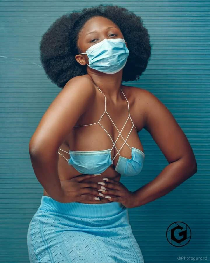 Creative or M@dness?? Lady Causes stir with her Nose Mask dress (photos)