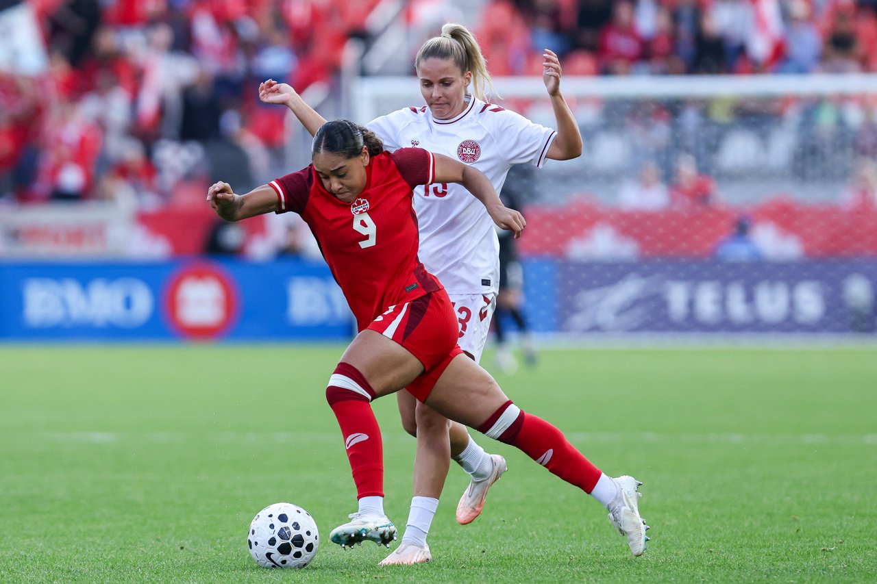 Olivia Smith #9 of Canada runs with the ball past Olivia Holdt #13 of Denmark during a Women's International Friendly match between Canada and Denmark at BMO Field in Toronto, Ontario, Canada, on October 12, 2026. (Photo by Indrawan Kumala/NurPhoto via Getty Images)