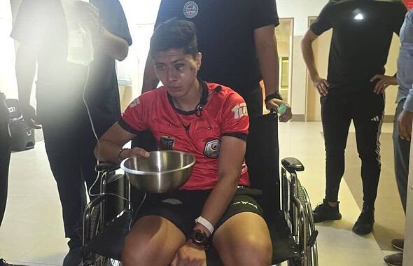 Assistant referee Lenin Ojeda was left injured after the shocking incident