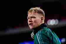 Goalkeeper Aaron Ramsdale of Arsenal looks on while warming up prior to the UEFA Champions League Group B match between PSV and Arsenal at the Phil...