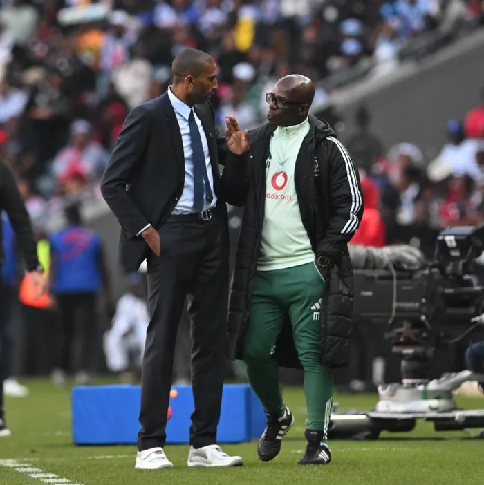Orlando Pirates coach Abdeslam Ouaddou and his now former assistant Mandla Ncikazi, who has been confirmed to have left Soweto to return to Golden Arrows' head coaching job. 