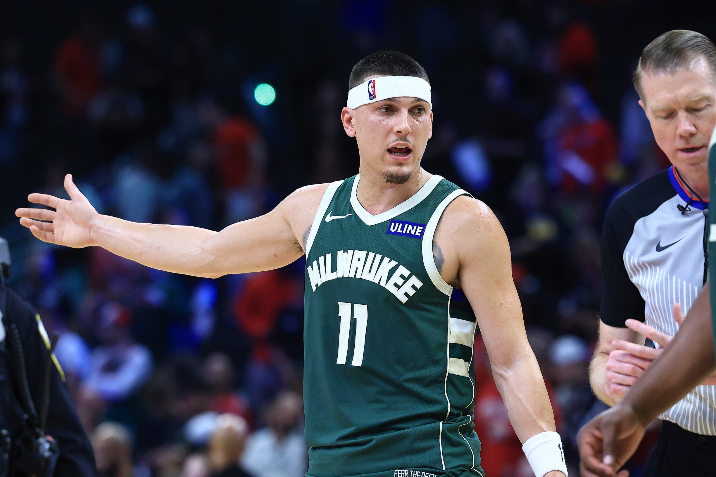 Oct 23, 2026; Milwaukee, WI, USA;  Milwaukee Bucks guard Tyler Herro (11) negotiates with referee Ed Malloy during the fourth quarter against the Chicago Bulls at Fiserv Forum.  Mandatory Credit: Brad Repplinger-Imagn Images