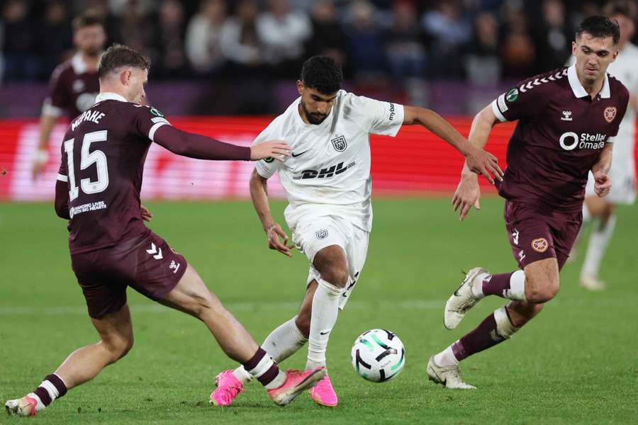 Heart of Midlothian's Josh McPake in action with Nordsjaelland's Ibrahim Adel 