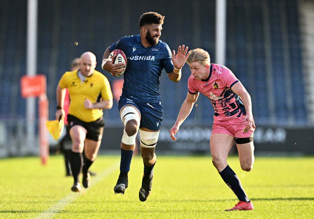 Hyron Andrews of Sale Sharks makes a break past Josh Hodge of Exeter Chiefs in 2025