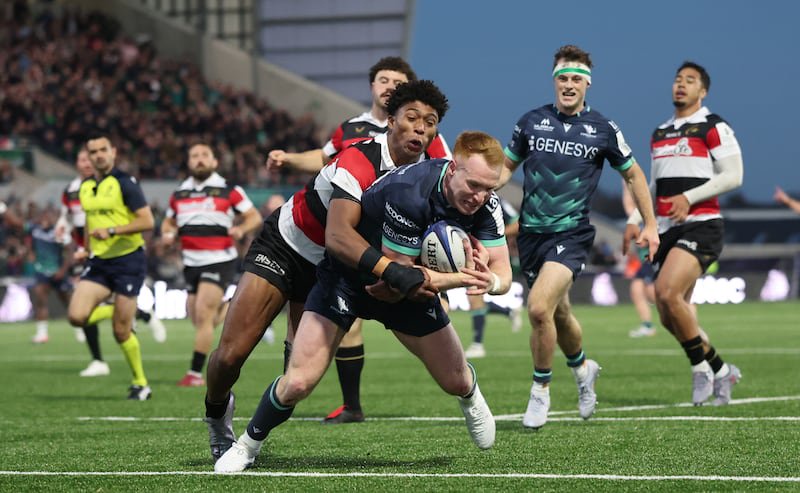 Ciarán Frawley scores Connacht's fifth try despite Saracens' Noah Caluori. Photograph: James Crombie/Inpho