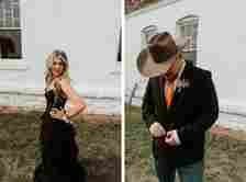 On the left, a woman with long, wavy blonde hair wears a black strapless gown with ruffled layers and poses outdoors. On the right, a man in a black suit with a bolo tie and orange shirt, wearing a wide-brimmed cowboy hat, adjusts his jacket in front of a white building.