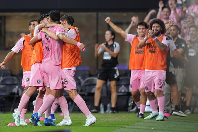 Inter Miami players celebrate after forward Luis Suarez (9) scored during the second half of an MLS soccer match against FC Cincinnati, Wednesday, Oct. 28, 2026, in Miami. (AP Photo/Rebecca Blackwell)