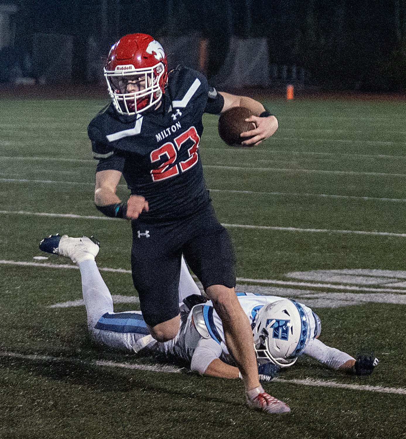 Milton senior captain Peter Skutnik on a run against Franklin at Brooks Field in Milton, Oct. 23, 2026.