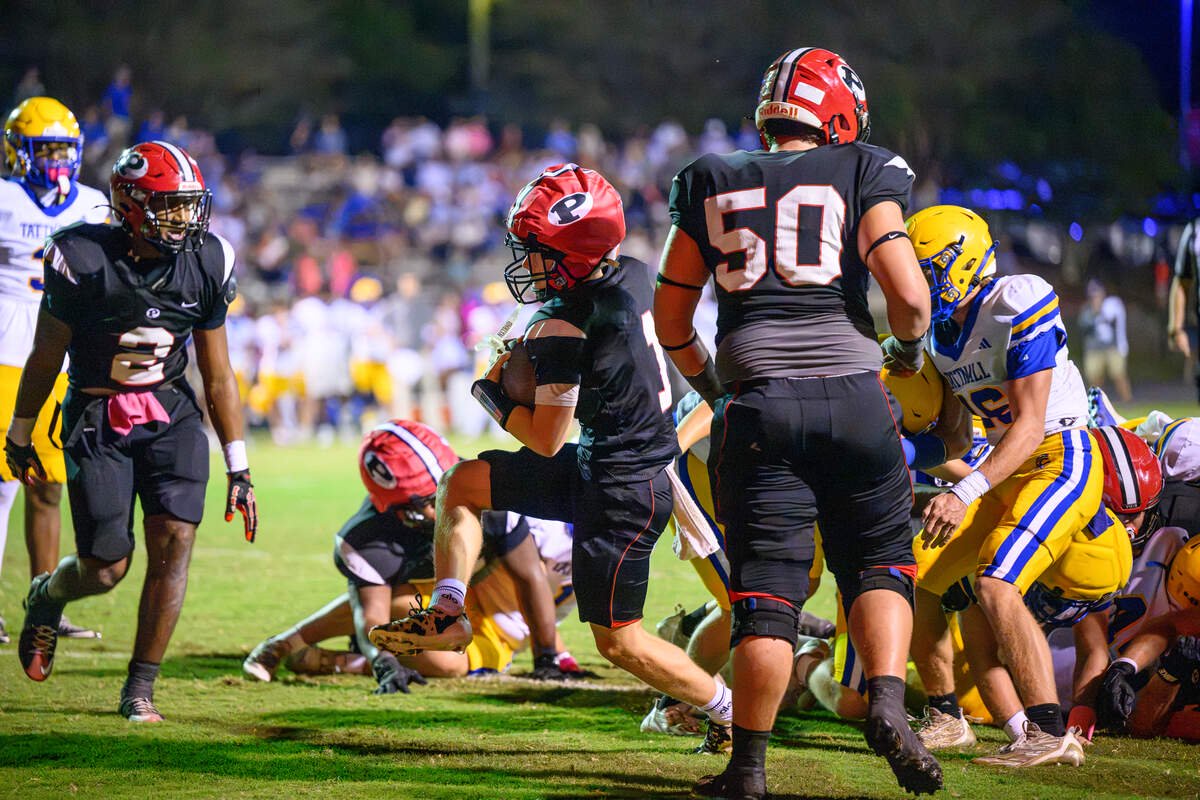FPD quarterback Cash Walker waltzes in to the end zone for an FPD touchdown against Tattnall Friday night.