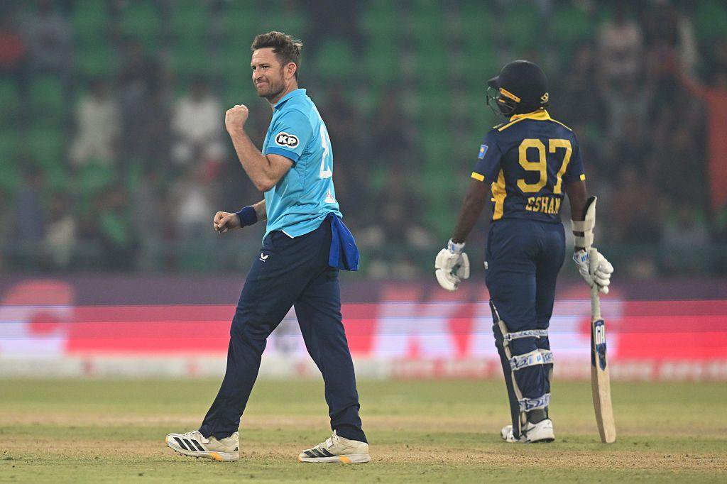Liam Dawson celebrates a wicket for England