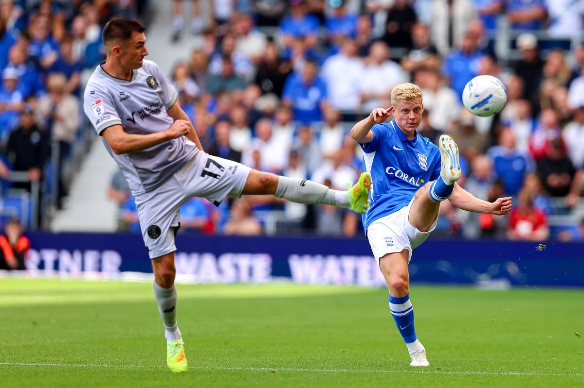 Birmingham City's Alex Cochrane plays a pass