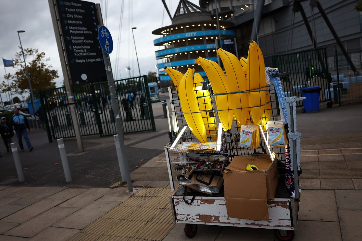 Inflatable bananas being sold at a memorabilia stall ahead of the UEFA Champions League 2026/27 League Phase MD2 match between Manchester City and Paris Saint-Germain