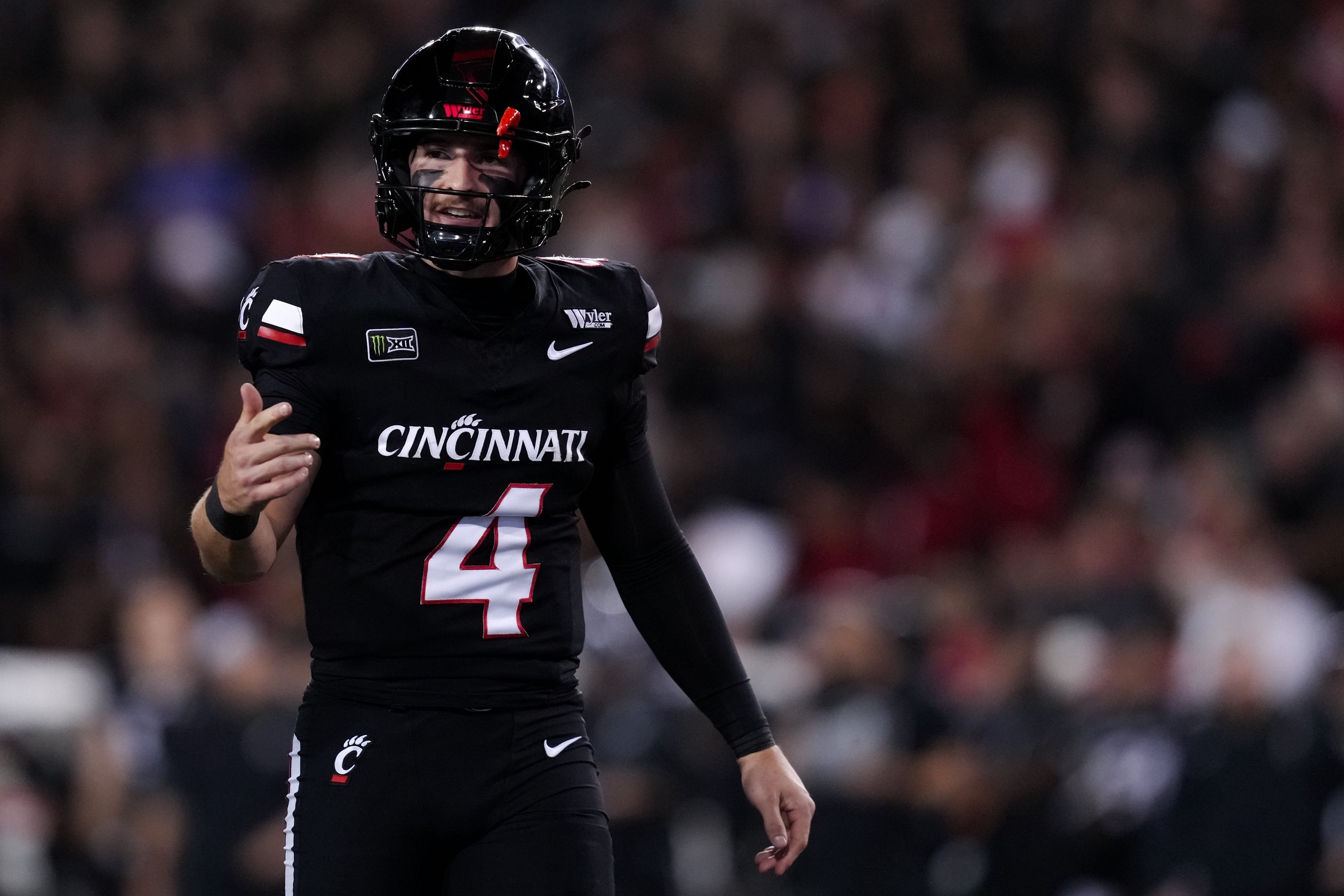 Cincinnati, Ohio, USA; Cincinnati Bearcats quarterback JC French IV reacts on the field during a stop in playagainst the Kansas State Wildcats in the first half at Nippert Stadium.