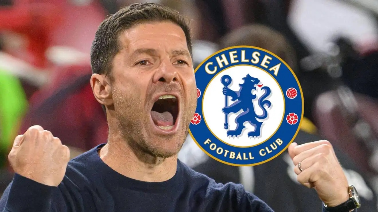 Chelsea manager Xabi Alonso next to the Chelsea badge - copyright F365