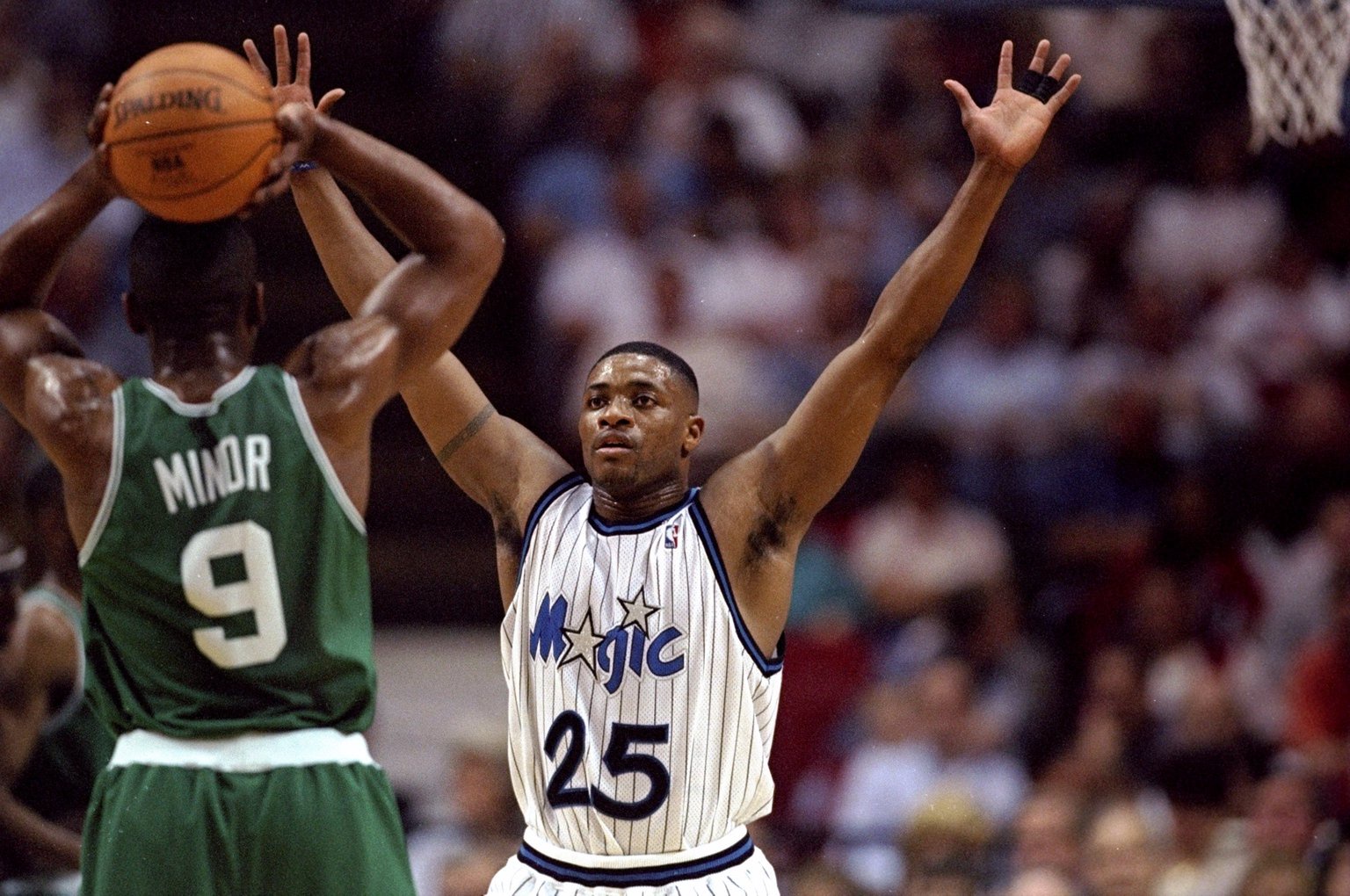 1 Apr 1998: Guard Nick Anderson of the Orlando Magic (right) in action against guard Greg Minor of the Boston Celtics during a game at the Orlando Arena in Orlando, Florida. The Celtics defeated the Magic 98-87. Mandatory Credit: Andy Lyons /Allsport