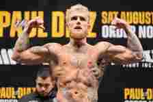 Jake Paul gestures to the crowd during weigh-ins for his fight against Nate Diaz at American Airlines Center on August 04, 2023 in Dallas, Texas