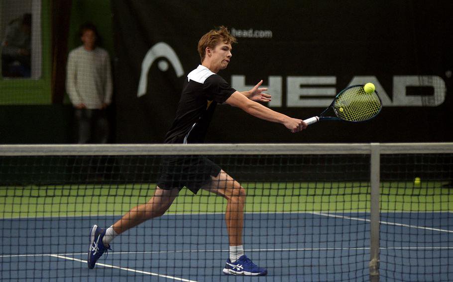 Matthew Suber reaches out to make a volley.