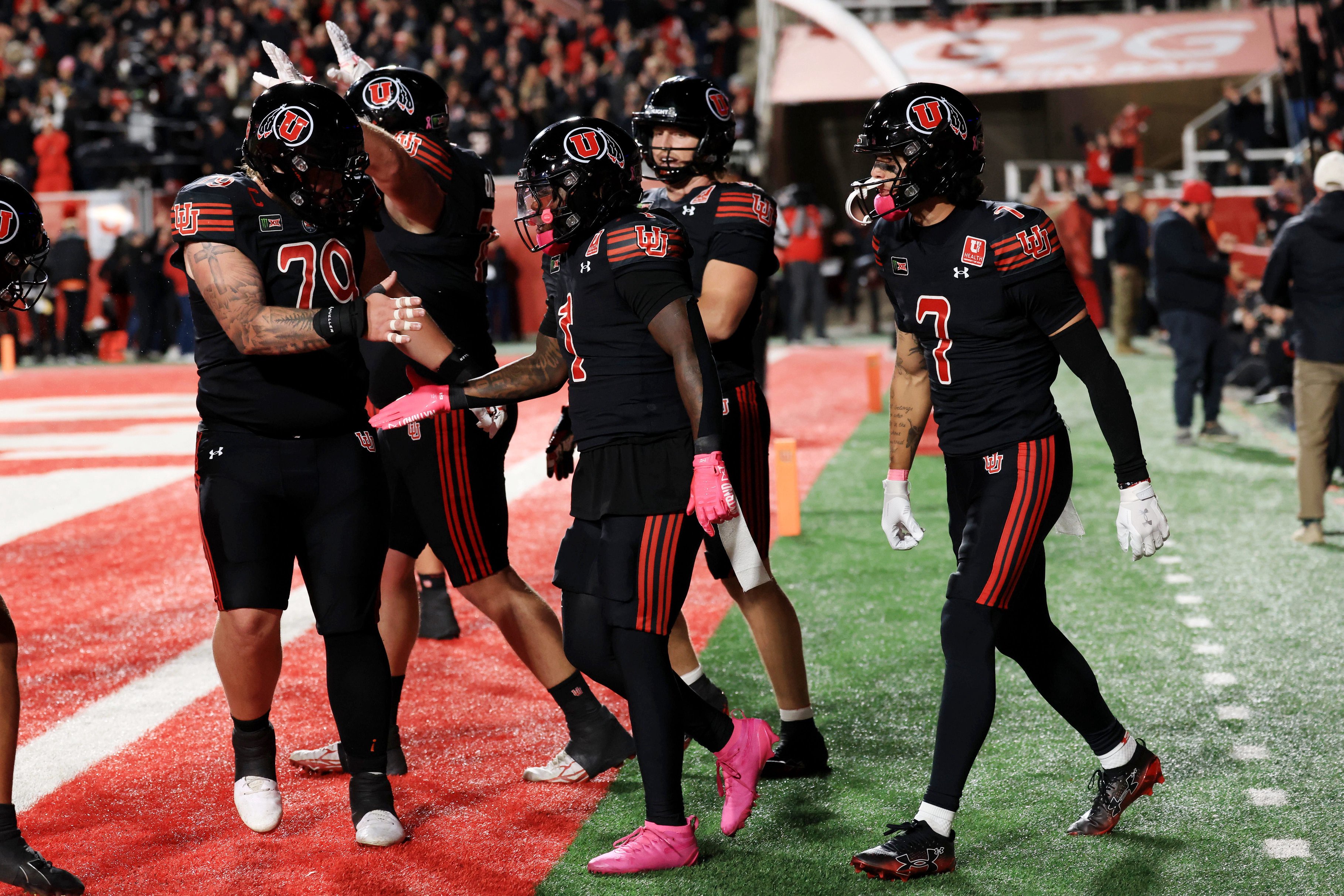 Oct 24, 2026; Salt Lake City, Utah, USA;  Utah Utes running back Wayshawn Parker (1) celebrates with teammates after scoring a touchdown during the fourth quarter against the Houston Cougars at Rice-Eccles Stadium.  Mandatory Credit: Rob Gray-Imagn Images