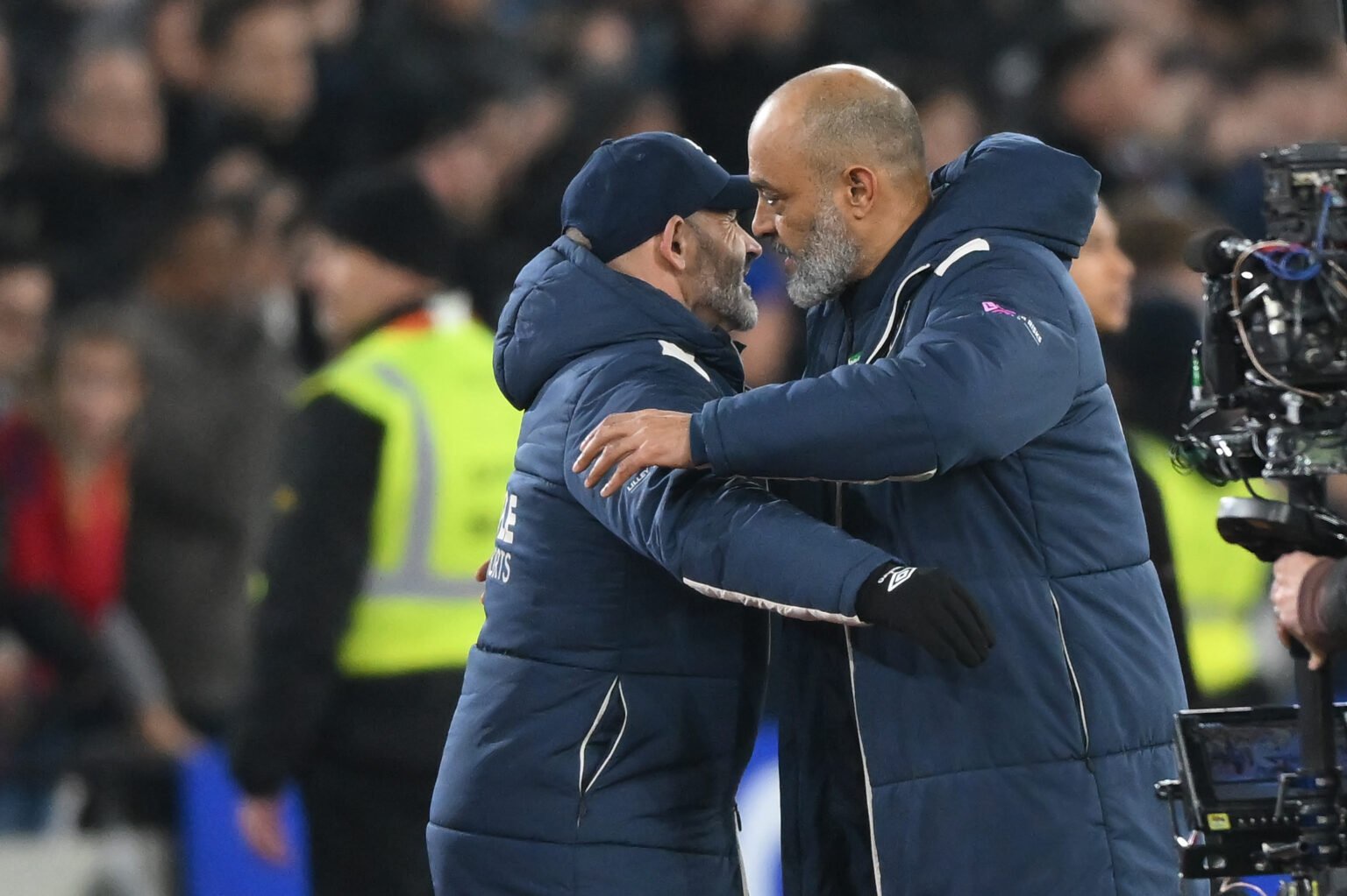 Paco Jemez and Nuno Espirito Santo embrace after West Ham United draw with Manchester City in the Premier League.