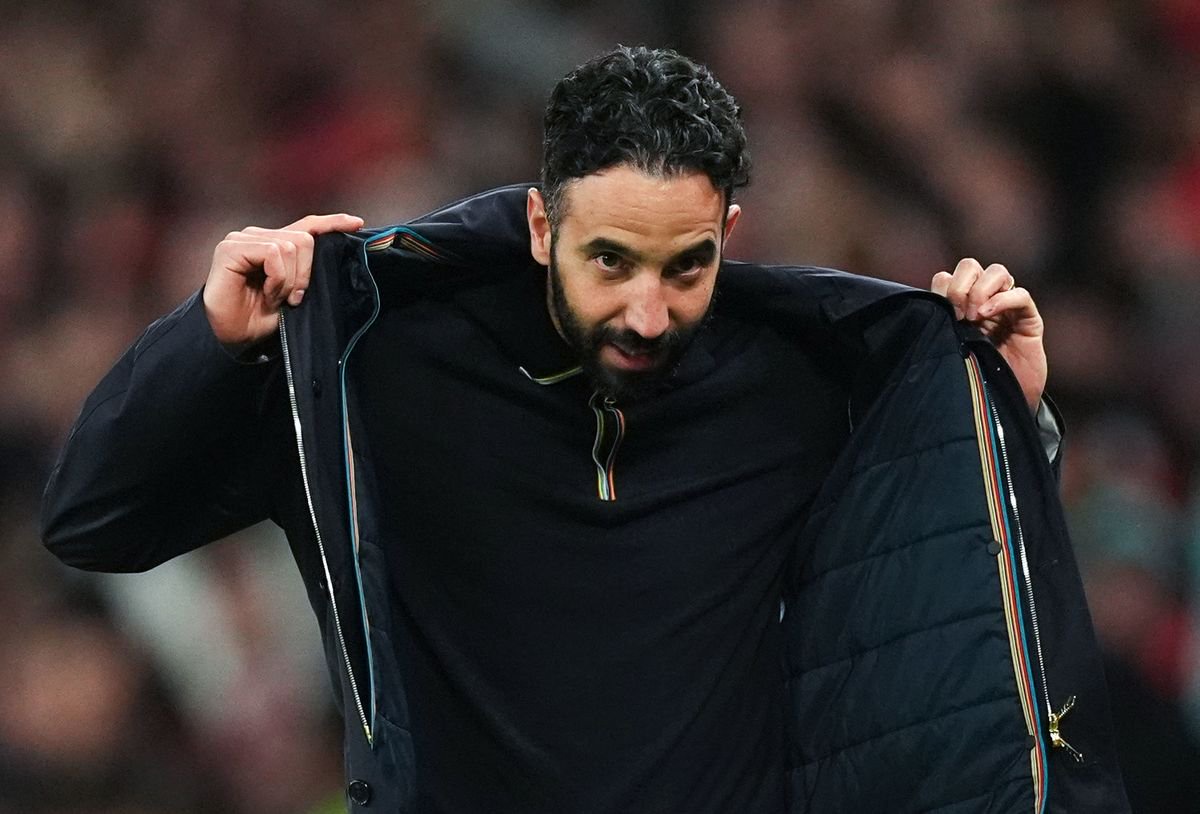 Ruben Amorim pulls his jacket