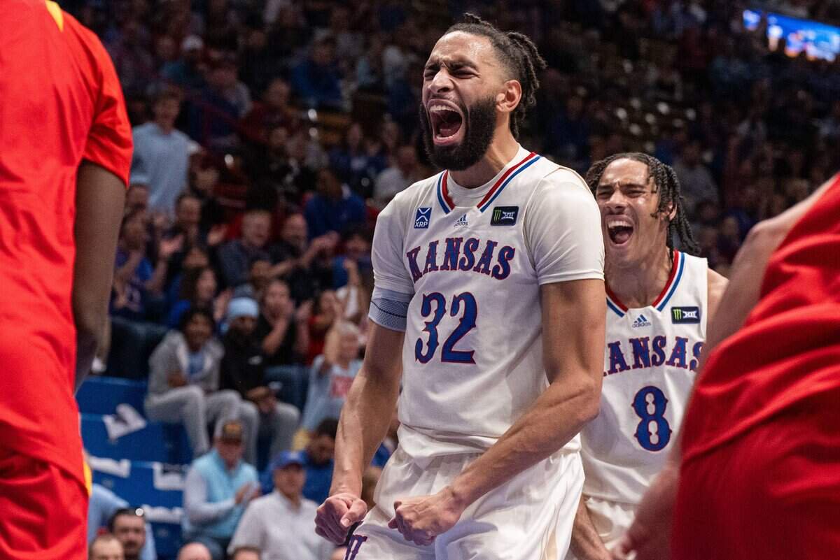 Kansas Jayhawks center Christian Reeves screams after scoring in the Jayhawks exhibition game vs. Pittsburg State Gorillas, on Friday, October 16, 2026, at Allen Fieldhouse. The exhibition game, a first for Late Night in the Phog, replaces the normal format of variety show style sketches and a team scrimmage.