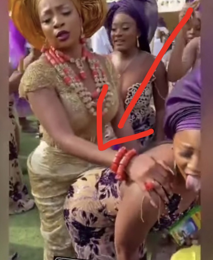 Bride gets social media talking after she was spotted doing this to her bridesmaid