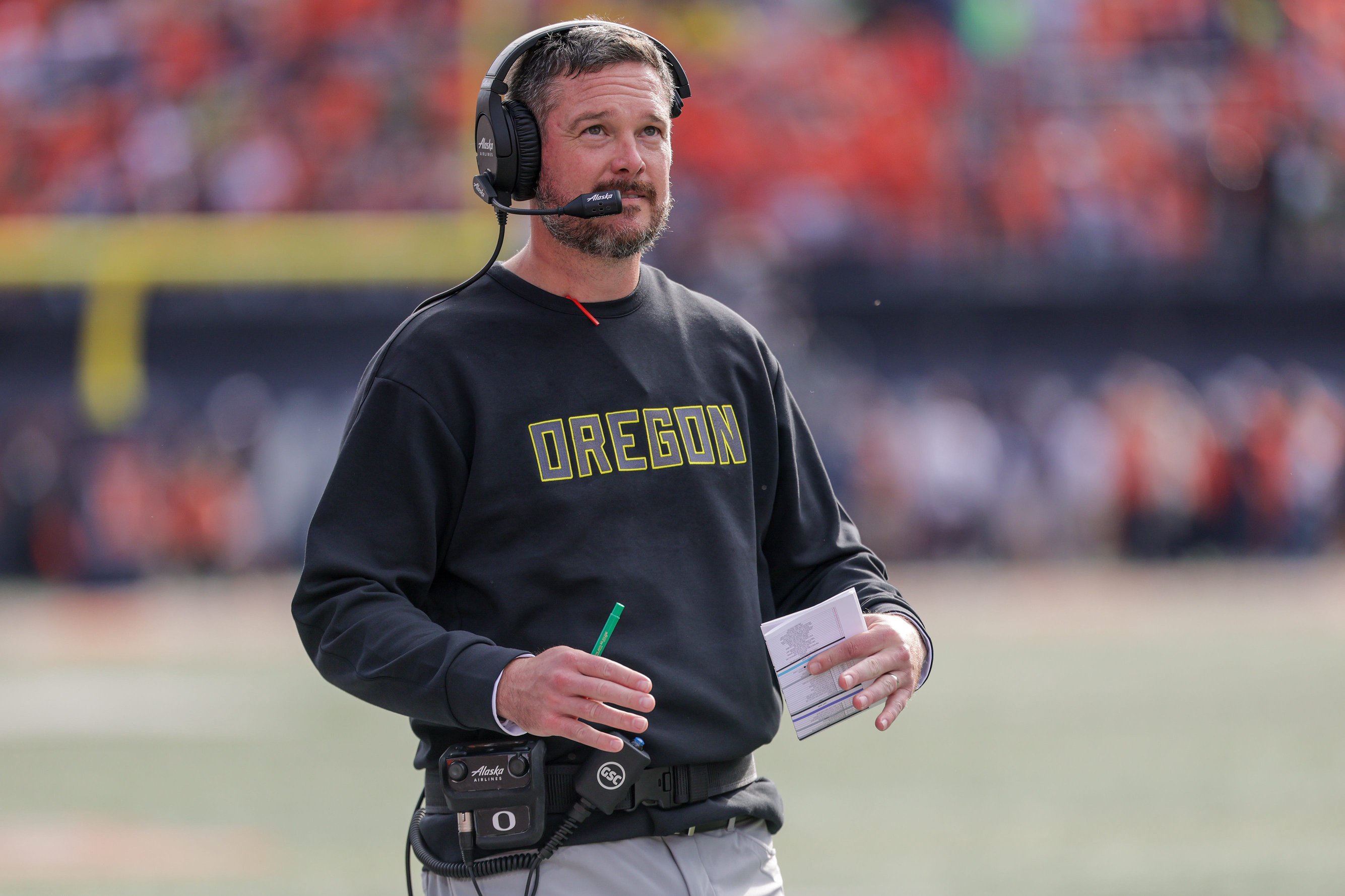 Oregon head coach Dan Lanning looks up at the scoreboard during the first half against the Illinois Fighting Illini at Memorial Stadium on October 24, 2026 in Champaign, Illinois.