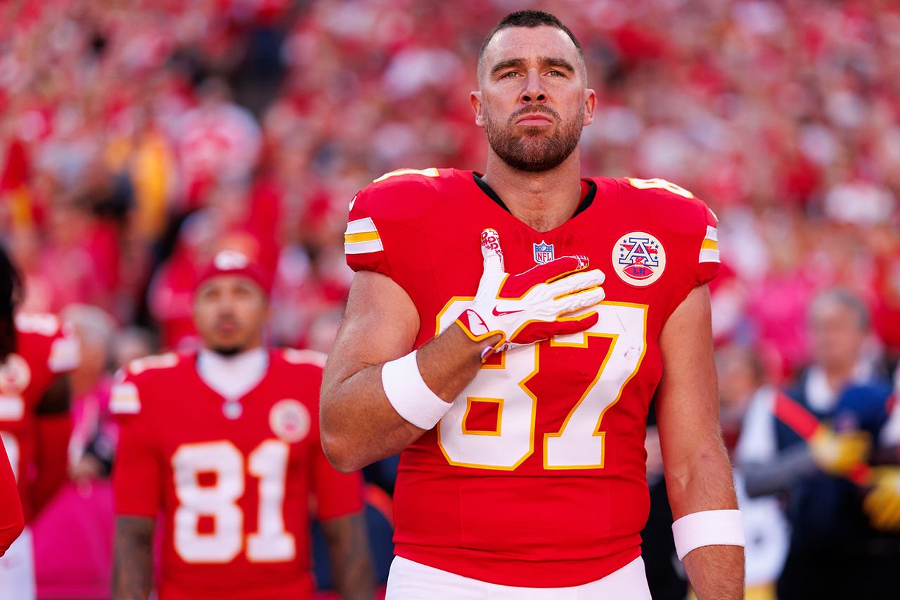 Travis Kelce stands on the sidelines during the national anthem before the Chiefs-Seahawks game on Sunday, Oct. 25, 2026.Credit: Brooke Sutton/Getty