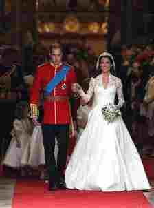 Prince William and Princess Kate walking hand and hand out of Westminster Abbey