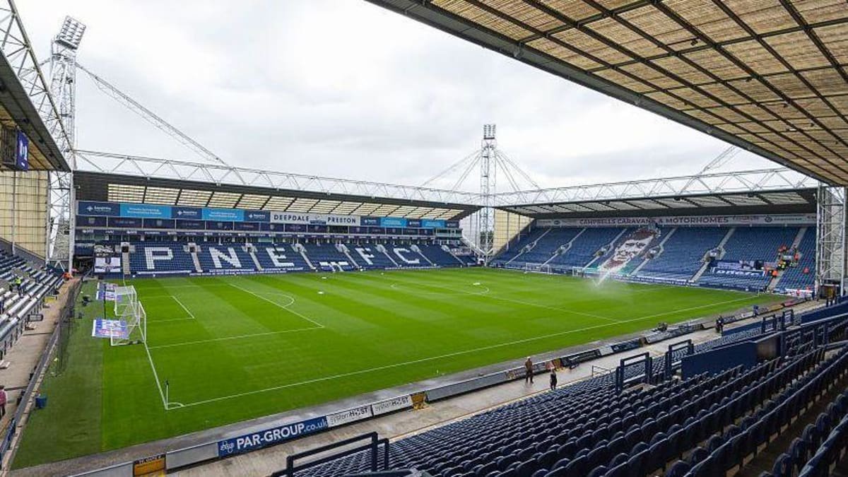 A general view of the inside of Deepdale with blue seats and PNE FC spelt out in white seats