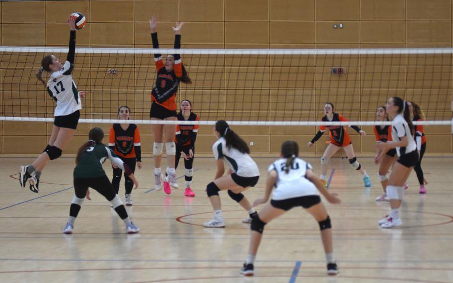 Spangdahlem’s Aliya Taylor tries to match the height of AFNORTH’s Sara Swift while attempting to block a shot during the finals on Saturday, Oct. 31, 2026, of the 2026 DODEA Division III European girls volleyball championships in Spangdahlem, Germany. Spangdahlem won the title in a close, five-set match, 25-17, 22-25, 25-7, 19-25, 15-11.