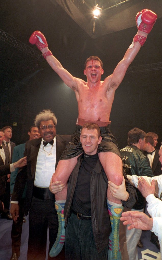 Close is carried round King's Hall after his split decision against Chris Eubank