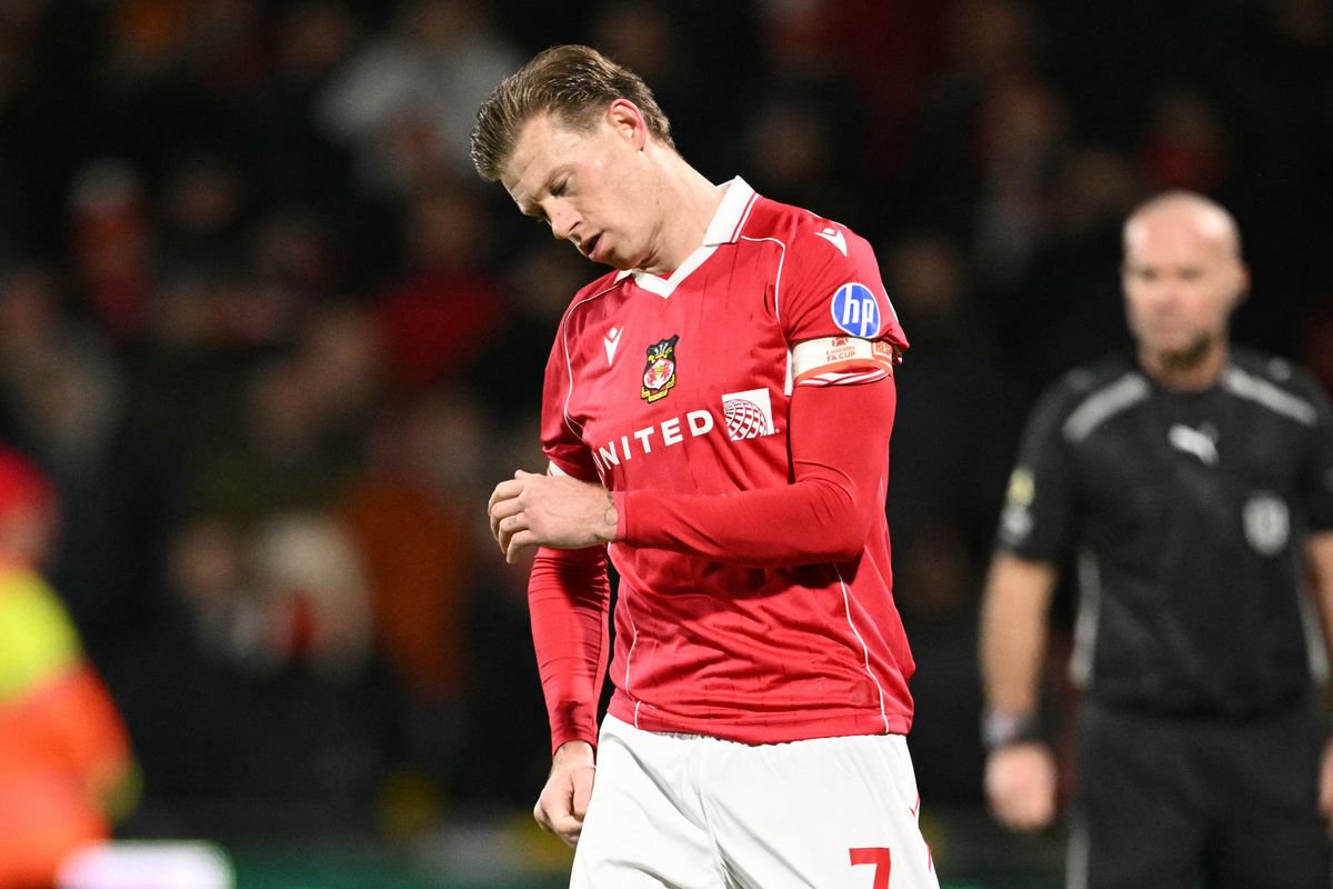 Wrexham's James McClean reacts after missing a penalty against Nottingham Forest
