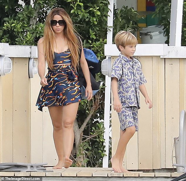 Family time: The hitmaker was also joined by her youngest son Sasha, aged eight, during the outing