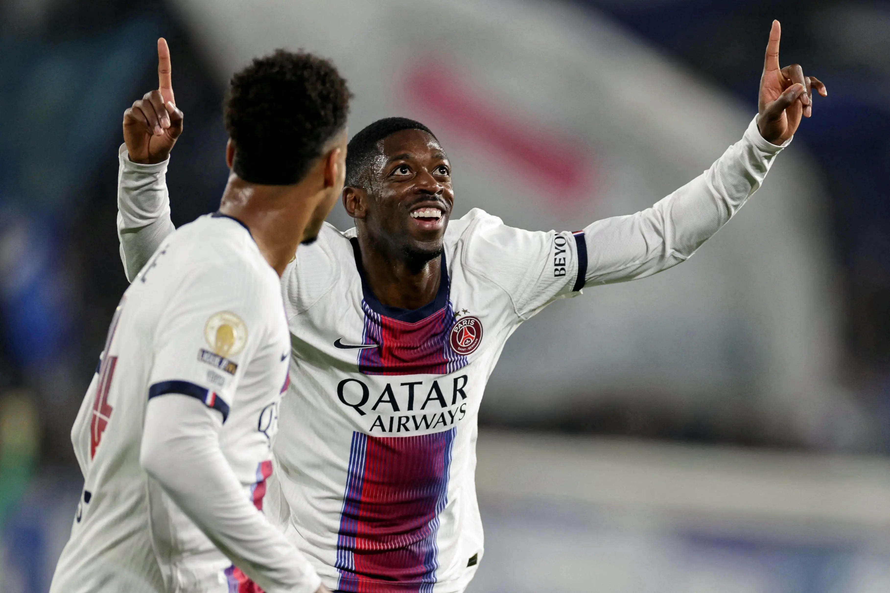 Paris Saint-Germain's French forward Ousmane Dembele celebrates after scoring his team's second goal during the French L1 football match between RC Strasbourg Alsace and Paris Saint-Germain  at the Stade de la Meinau in Strasbourg  