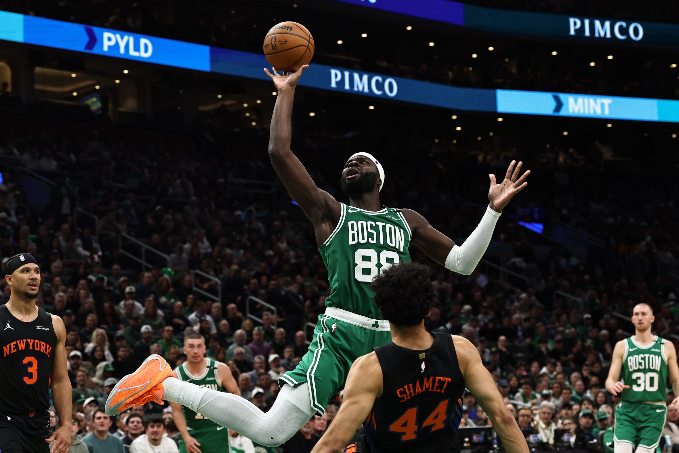 Oct 23, 2026; Boston, Massachusetts, USA; Boston Celtics center Neemias Queta (88) shoots over New York Knicks guard Landry Shamet (44) during the second quarter at TD Garden. Mandatory Credit: Winslow Townson-Imagn Images