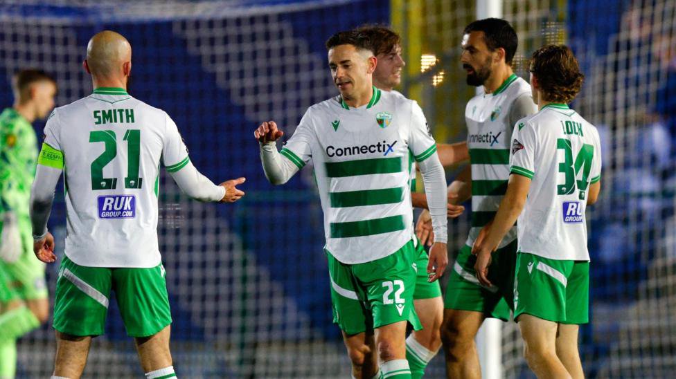 TNS players celebrate goal against Airbus Broughton UK